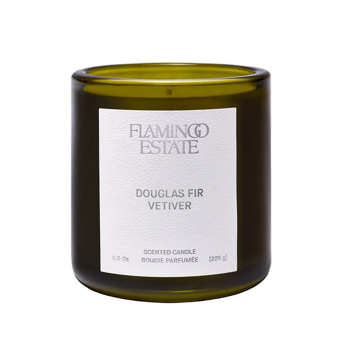 Flamingo Estate Douglas Fir candle with a white label on a white background