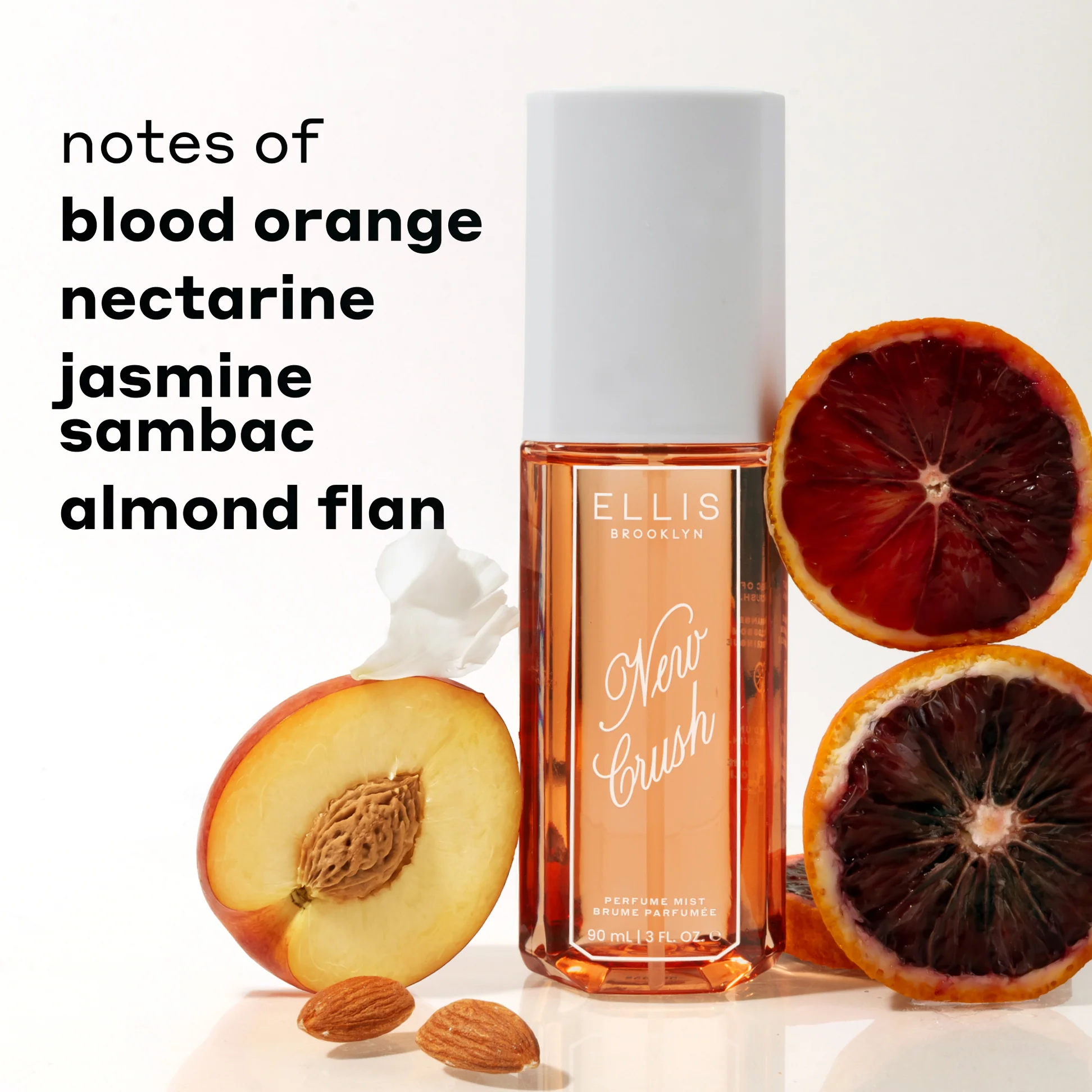 Perfume bottle with dried fruits and nuts on a white background