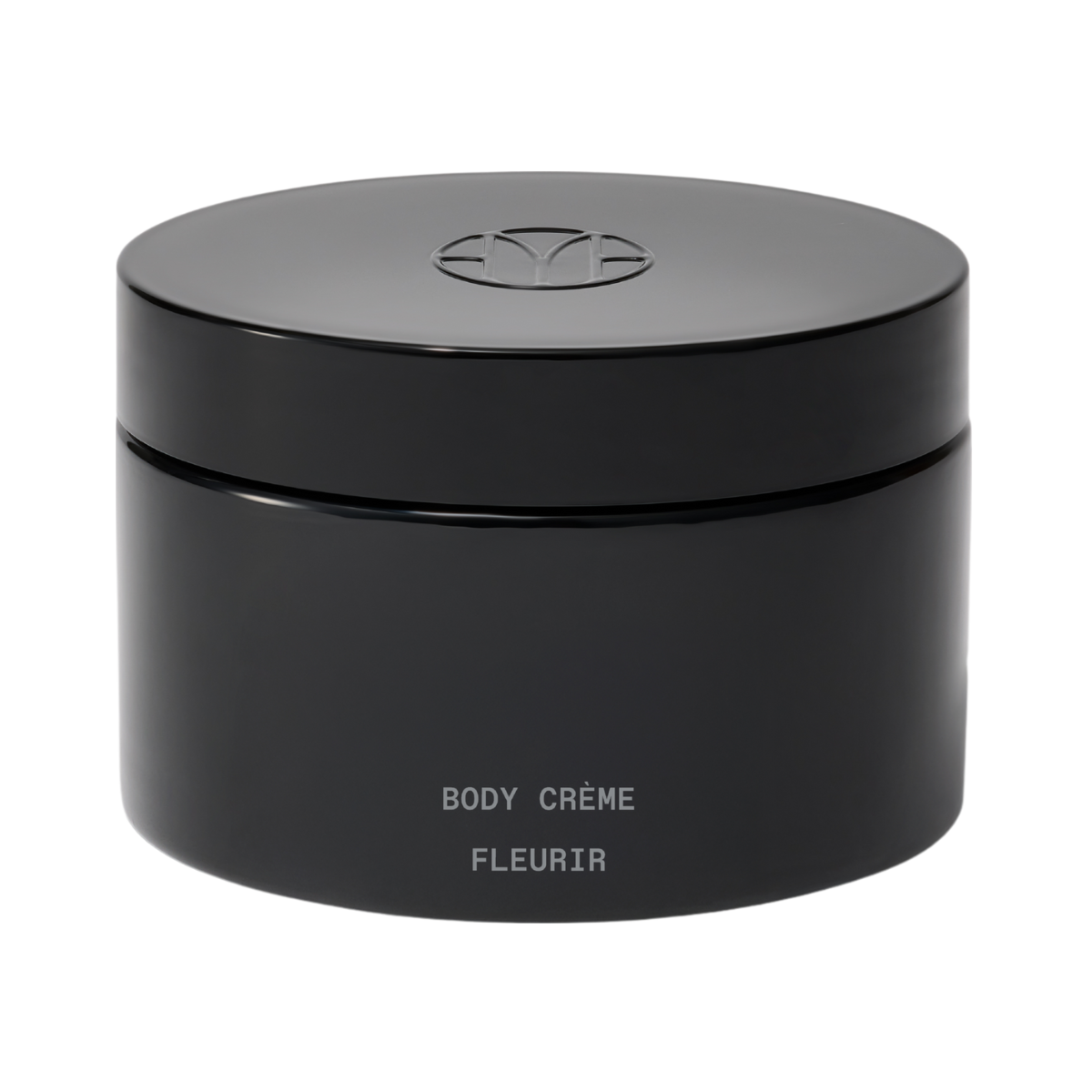 Black jar labeled 'BODY CREME FLEURIR' on a white background