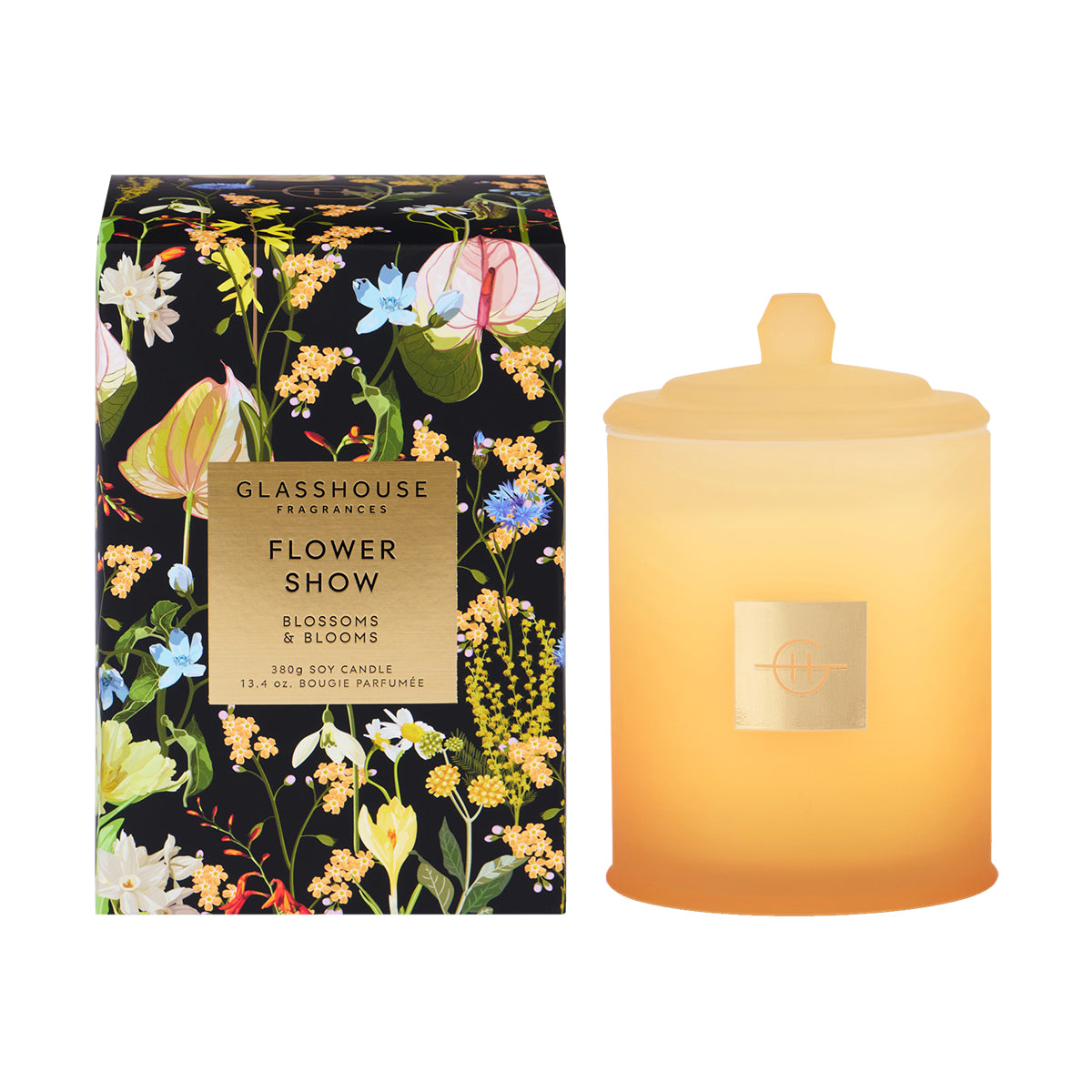 Glasshouse Candle with floral packaging on a white background