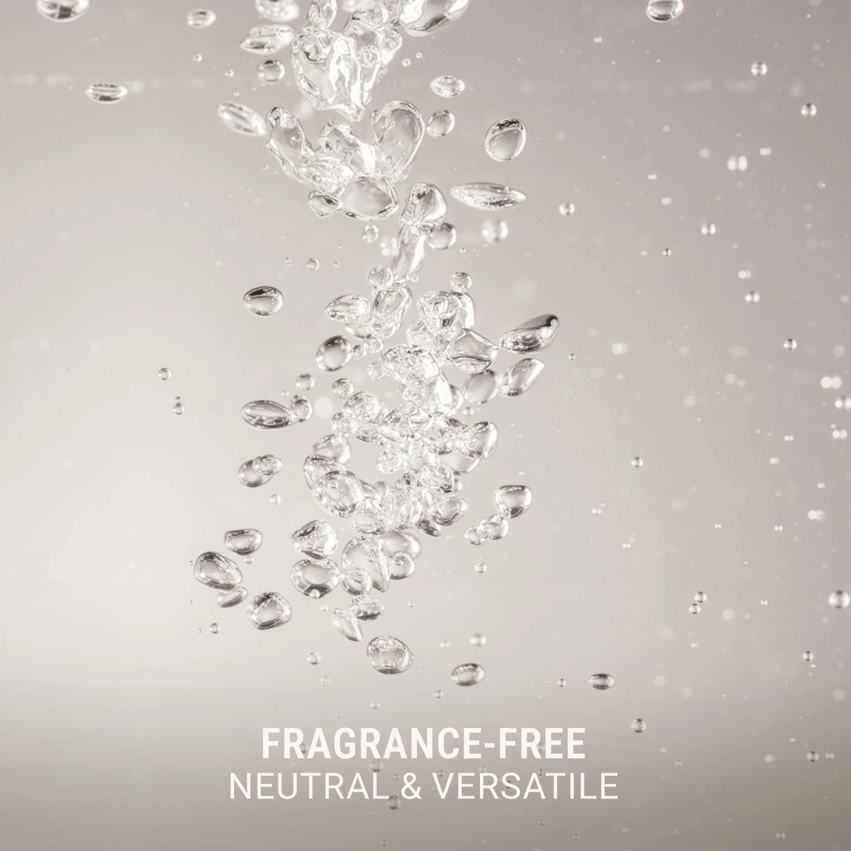 A clean studio-style graphic with clear water droplets falling against a soft warm gray background, with the text 'FRAGRANCE-FREE NEUTRAL & VERSATILE' at the bottom.