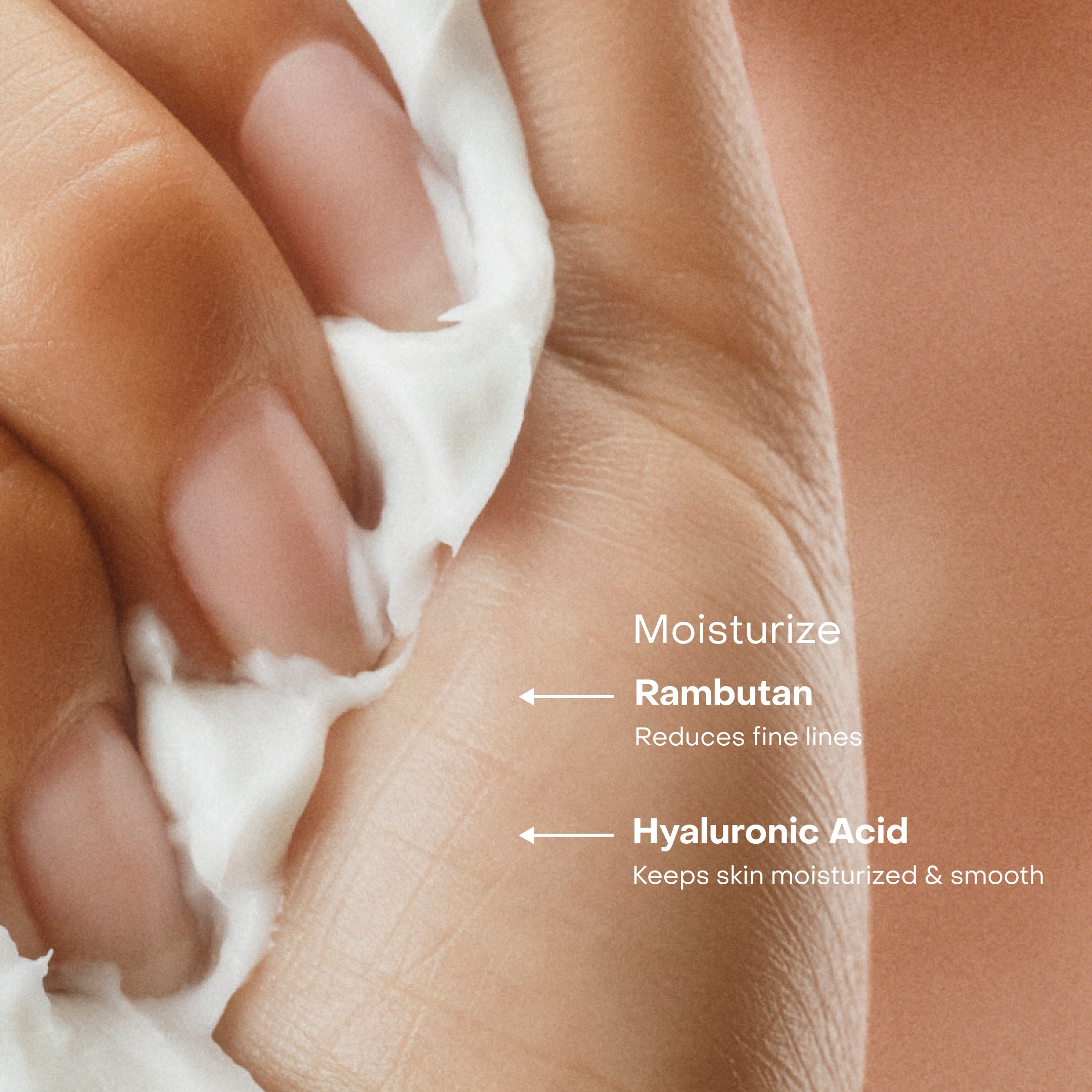 Hand holding white product with notes about Rambutan and Hyaluronic Acid