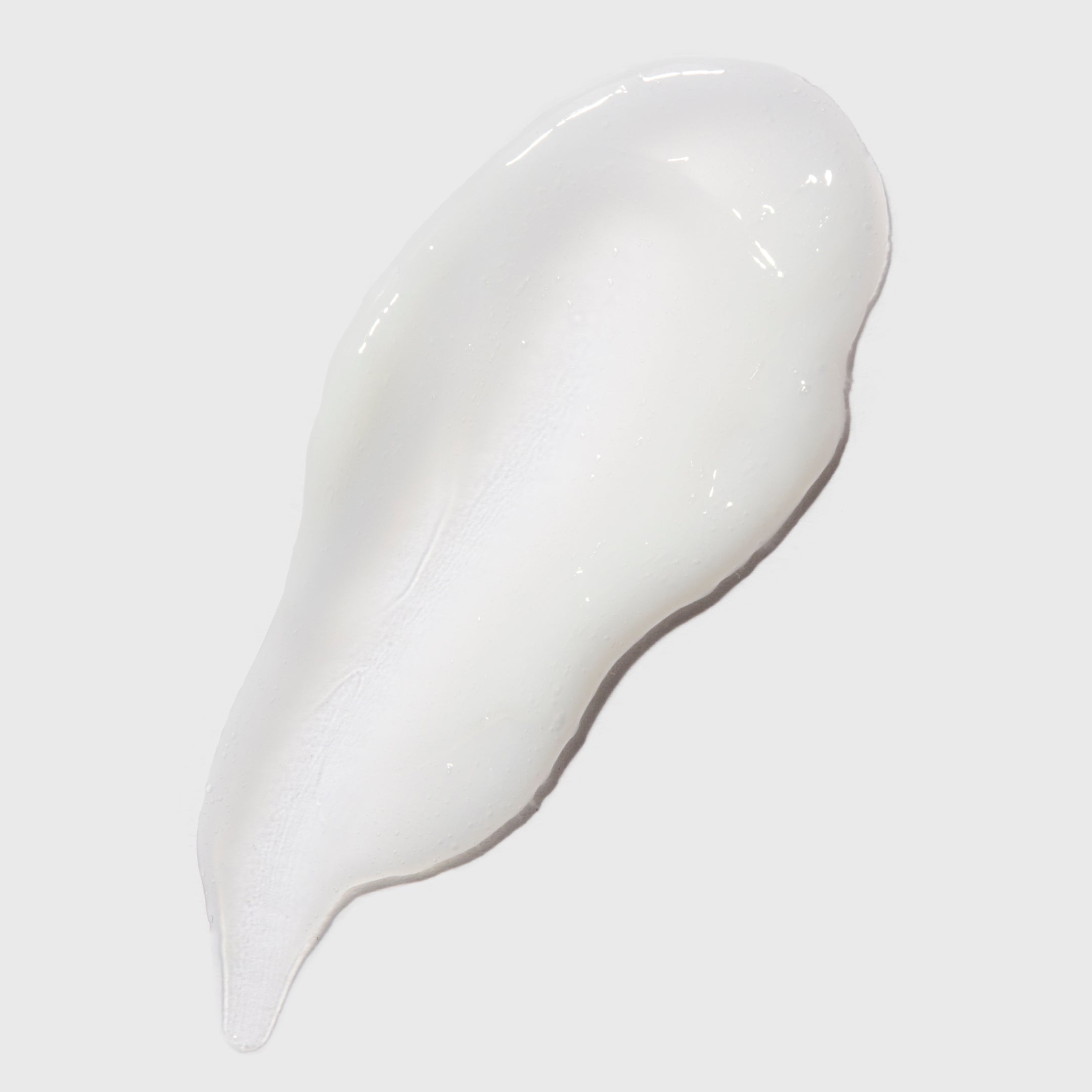White cream or gel on a white background