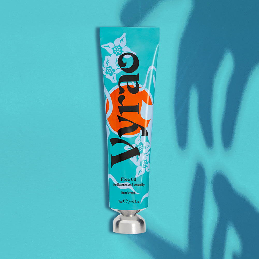 Vyrao hand cream tube on a blue background