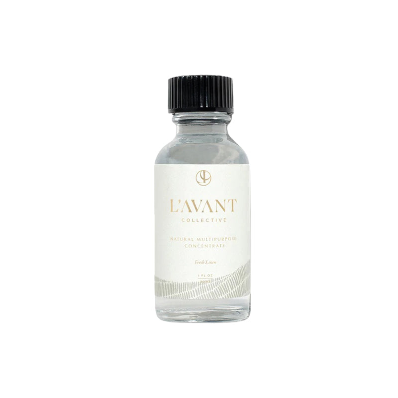 Clear bottle with black cap and 'L'AVANT' label on a white background