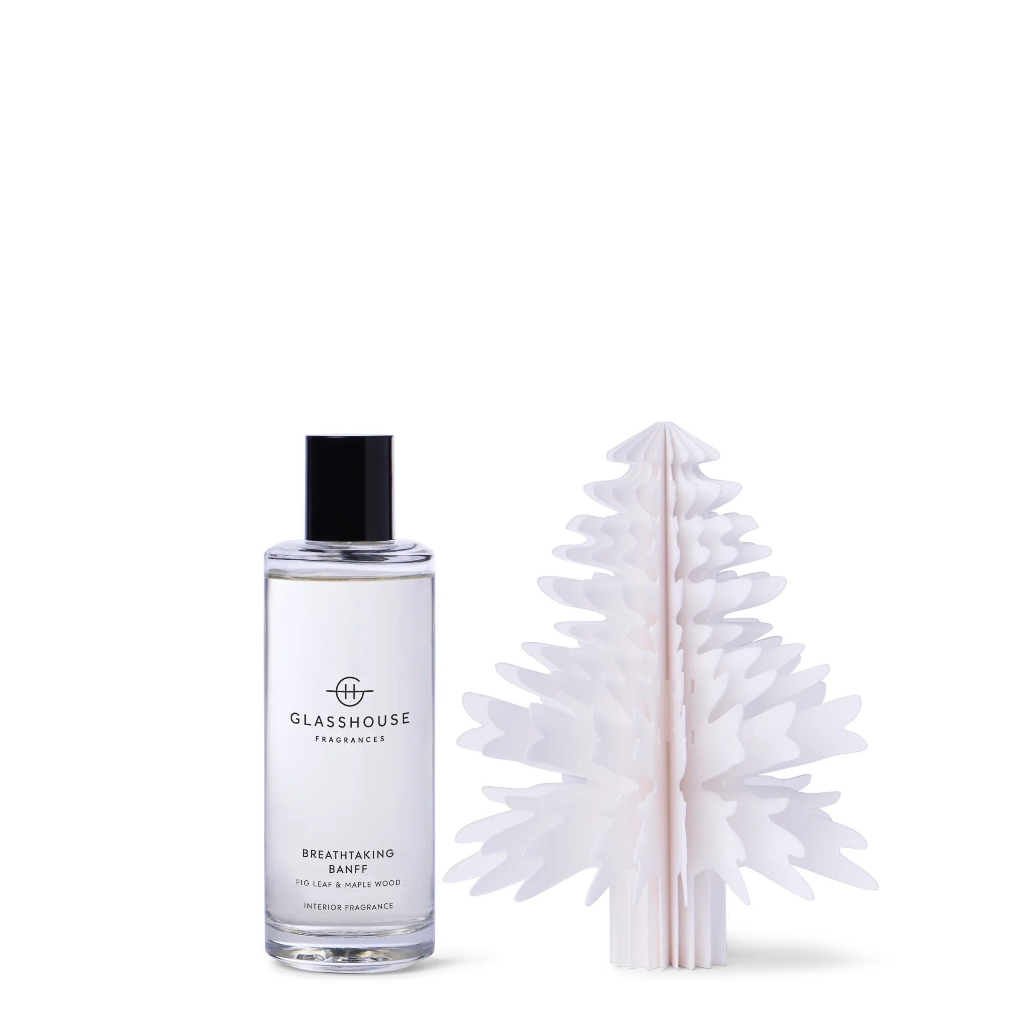 Glasshouse Fragrances bottle and decorative diffuser on a white background