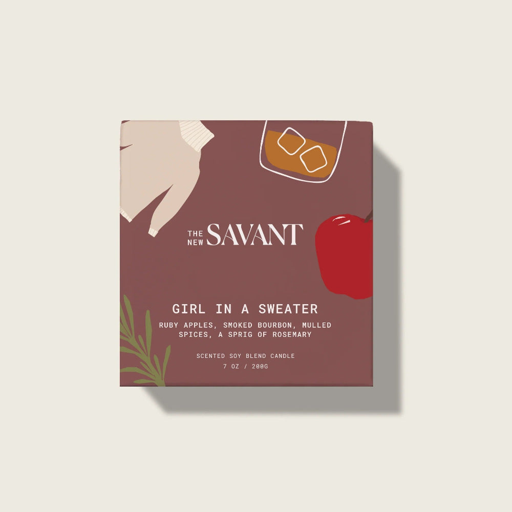 Candle packaging for 'Girl in a Sweater' by The Savant on a light beige background