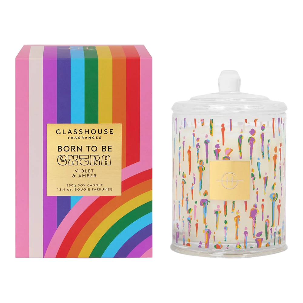 Glasshouse Fragrances candle with colorful packaging on a white background