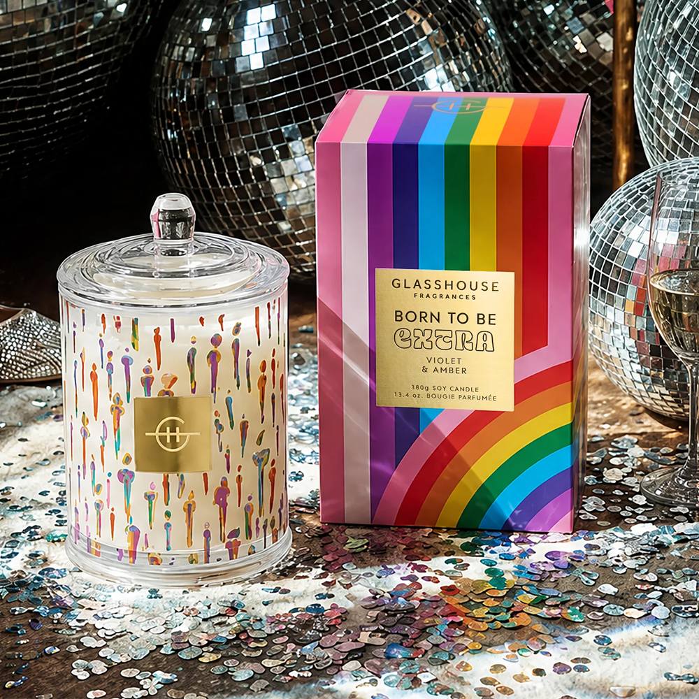 Glasshouse Fragrances candle and packaging with disco balls in the background