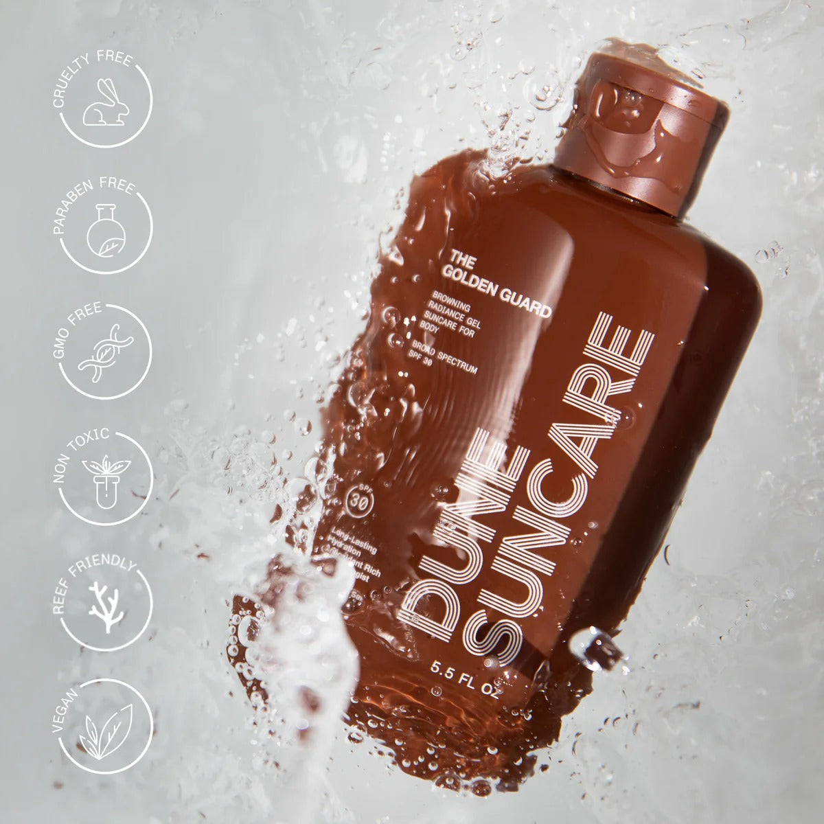 Brown bottle of Dune SunCare on a light gray background with brand name and product details.
