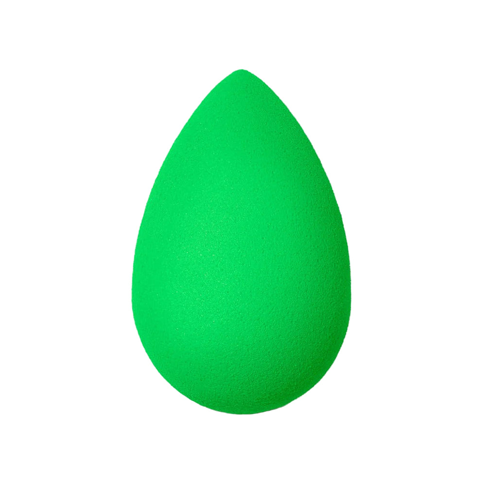 Green makeup sponge on a white background