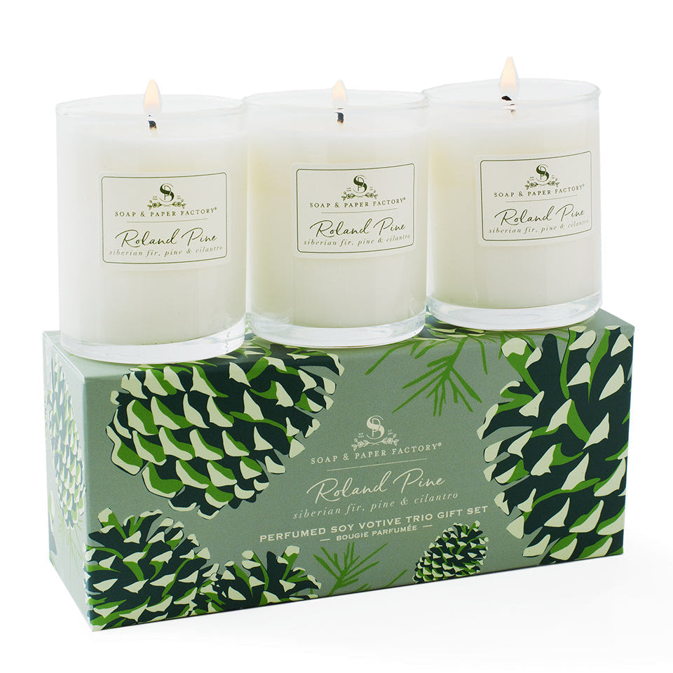 Roland Pine Votive candles in a decorative box with a pine cone design on a white background