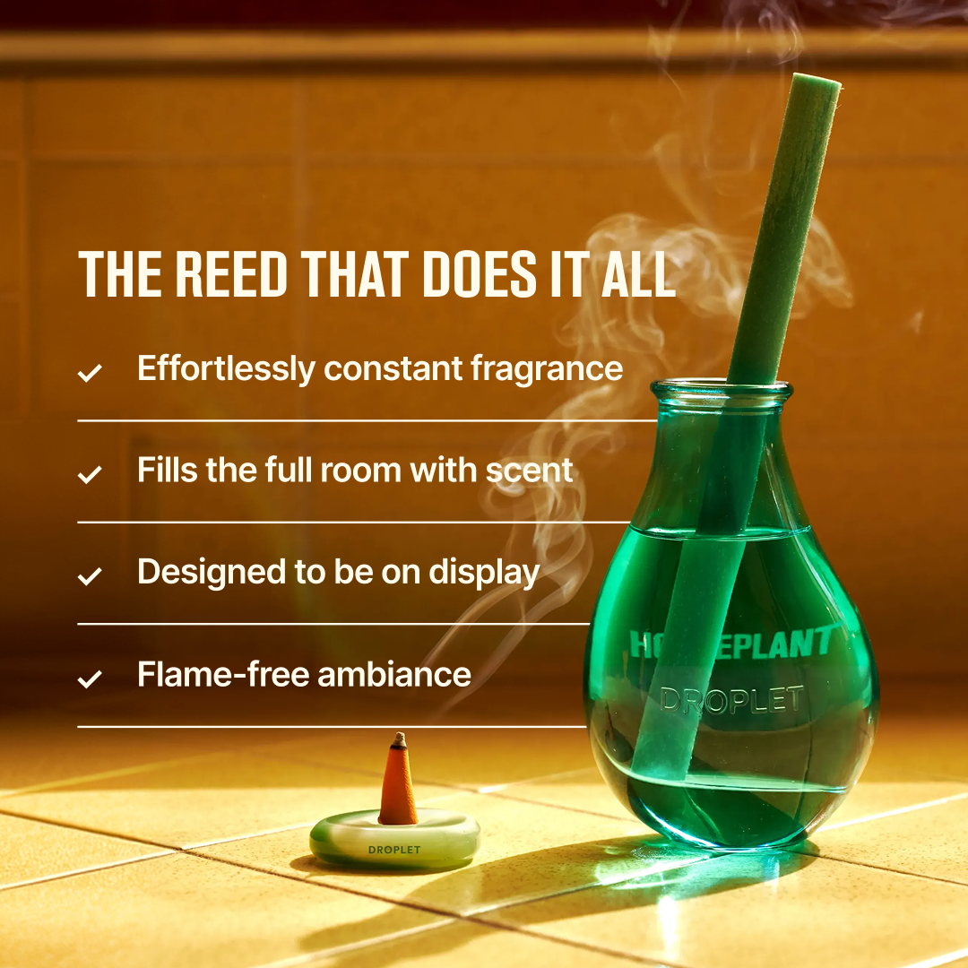 A green glass droplet bottle with a bamboo-style reed stopper and a small incense burner on a tiled surface, with smoke rising and marketing text on the left.