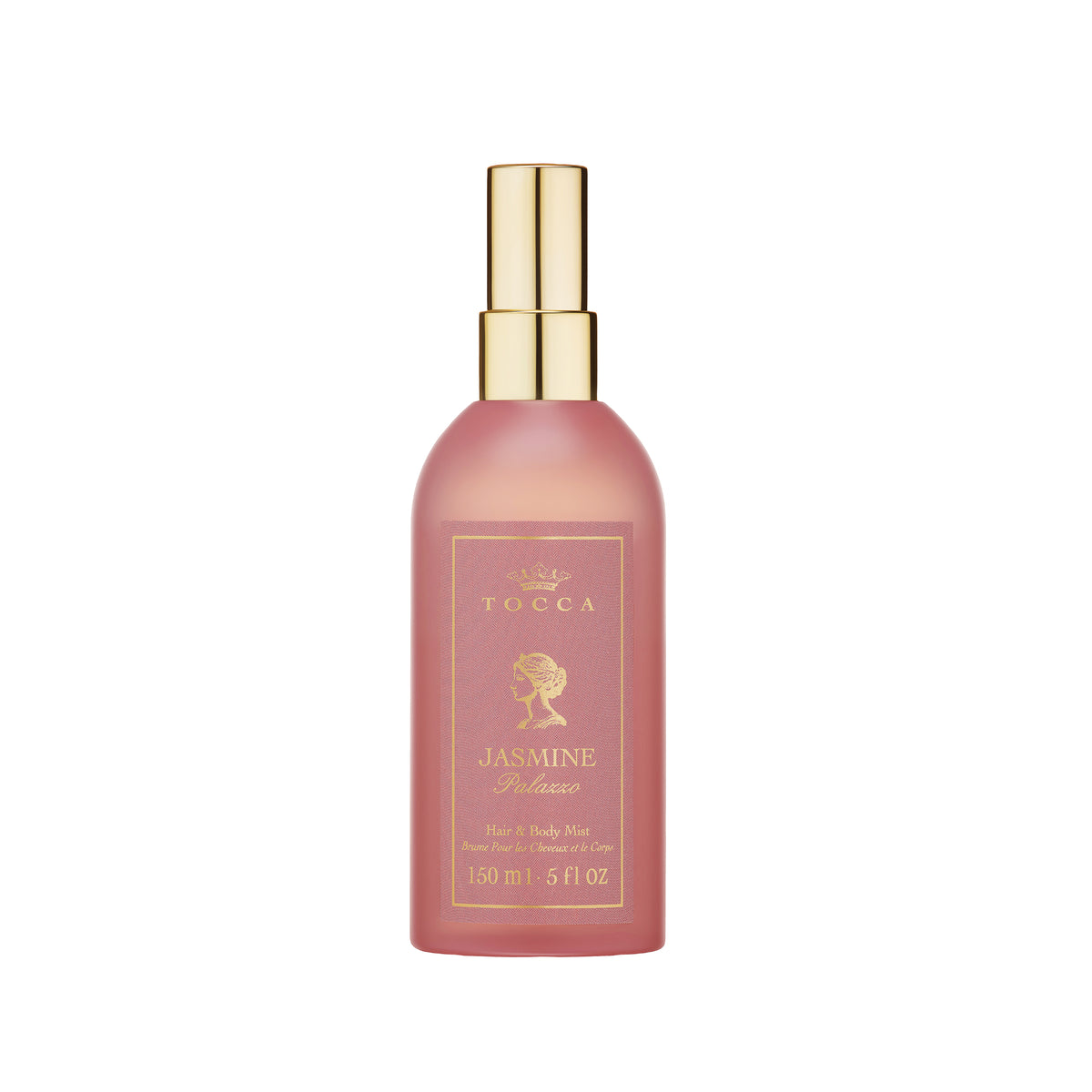 A bottle of TOCCA Jasmine Palazzo - Hair and Body Mist in a dusty rose pink color with a gold spray nozzle and gold label details, set against a plain white background.