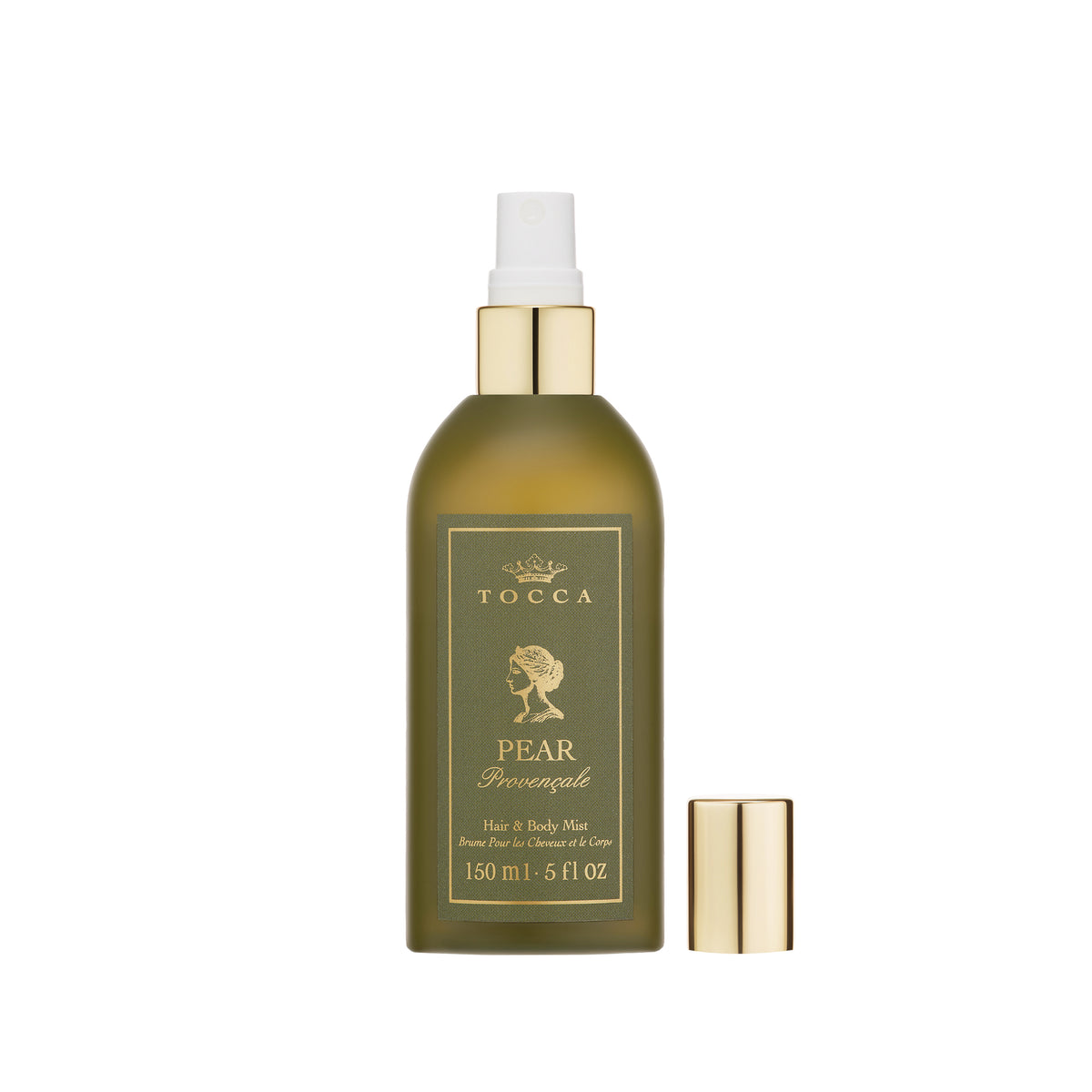 A bottle of TOCCA Pear Provencale - Hair and Body Mist in an olive green spray bottle with gold accents, shown with its gold cap off next to it on a white background.