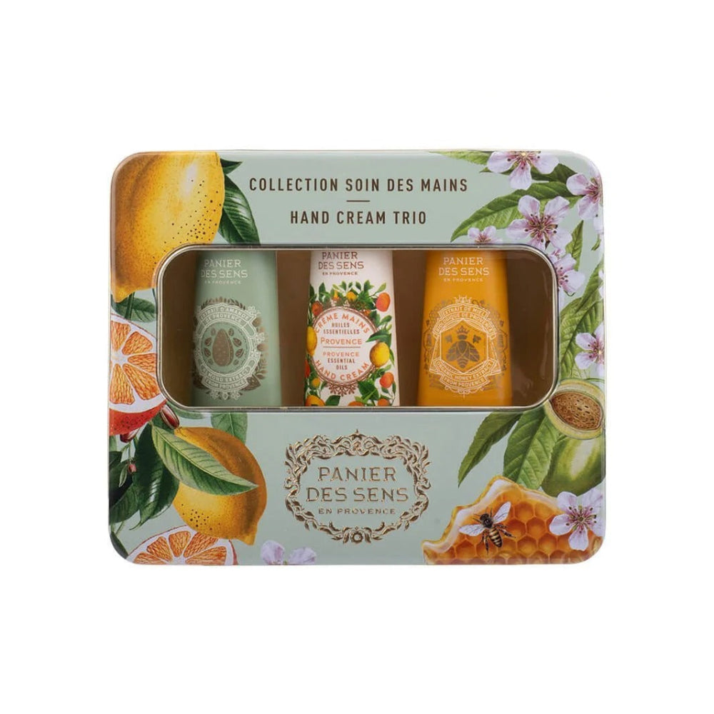 Hand cream trio set in a decorative tin with 'Panier des Sens' branding on a white background.