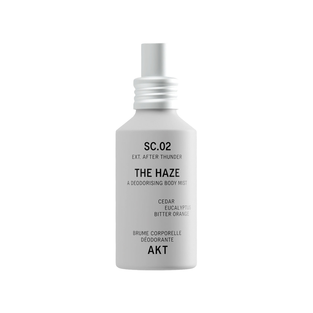 Bottle of AKT The Haze SC. 02 After Thunder deodorizing body spray on a solid white background.
