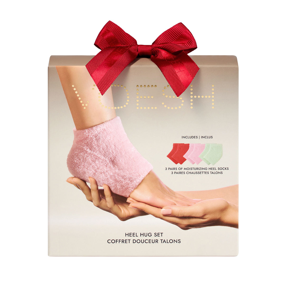 Box of heel hug set with pink heel socks and red bow, featuring the brand 'Voesh'.