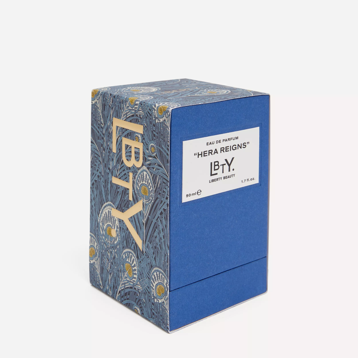 Blue perfume box with 'Hera Reigns' and 'LB.Y.' text on a white background
