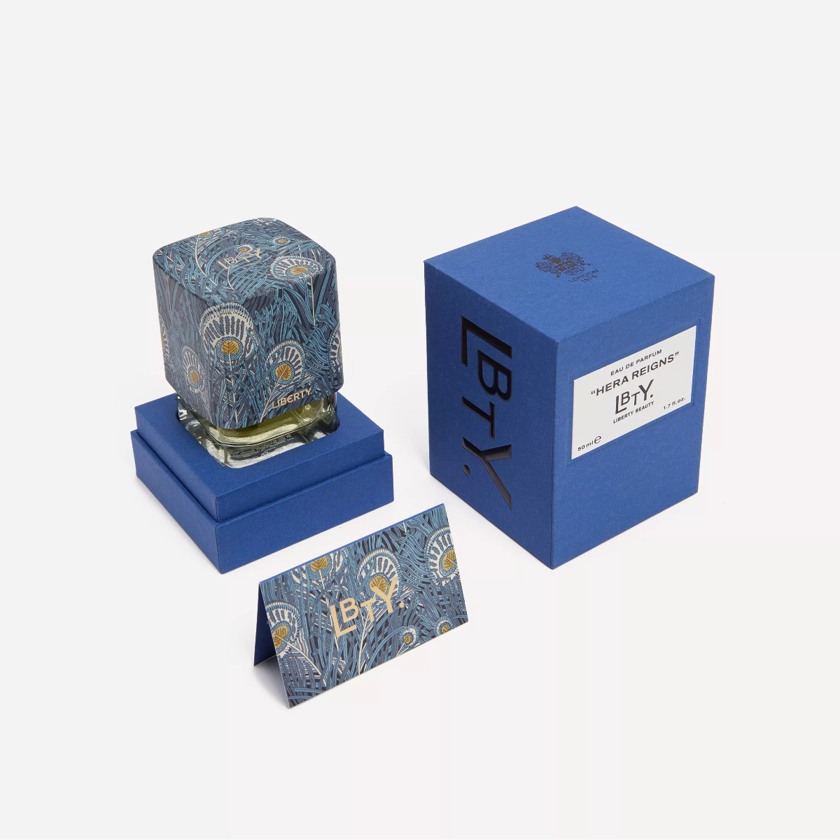 Blue decorative item with matching packaging on a white background