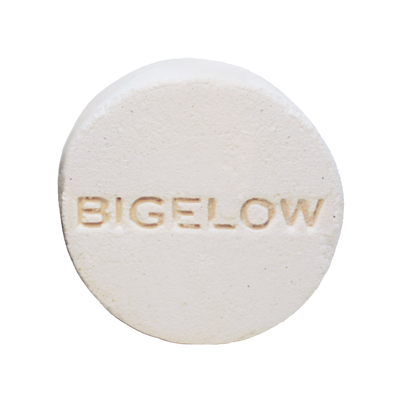 Herbal Comfort Shower Steamer Tablet with 'BIGELOW' engraved on a white background.