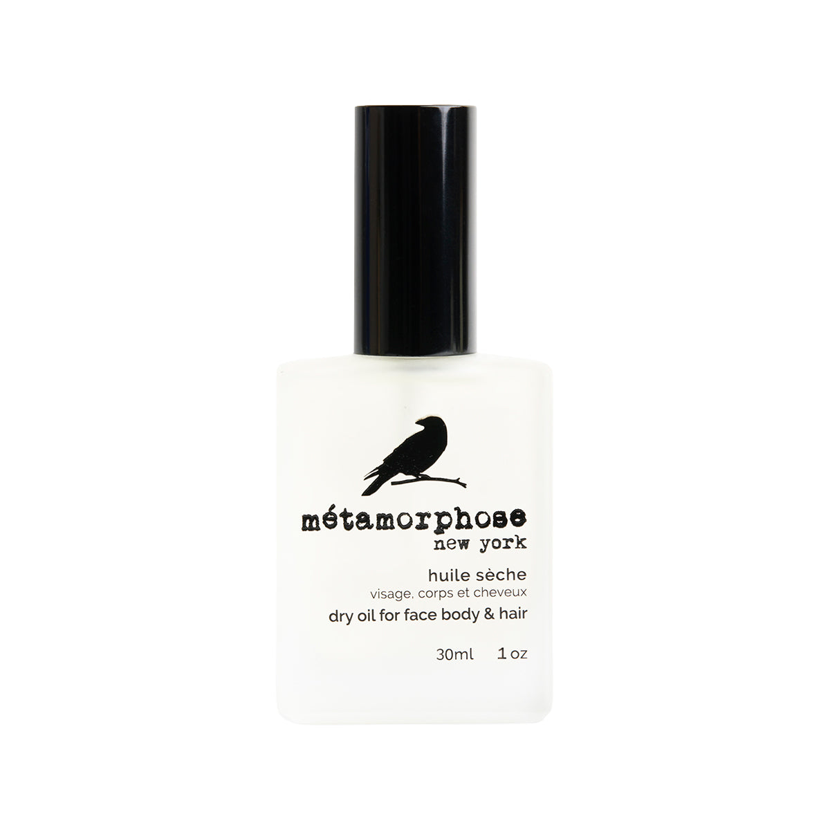 Metamorphose Dry Oil bottle with a black cap on a white background