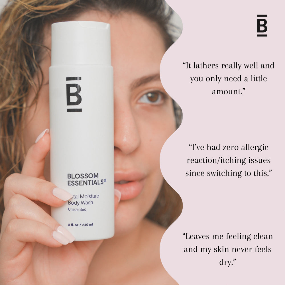 Woman holding a bottle of Blossom Essentials body wash with product reviews on a light pink background
