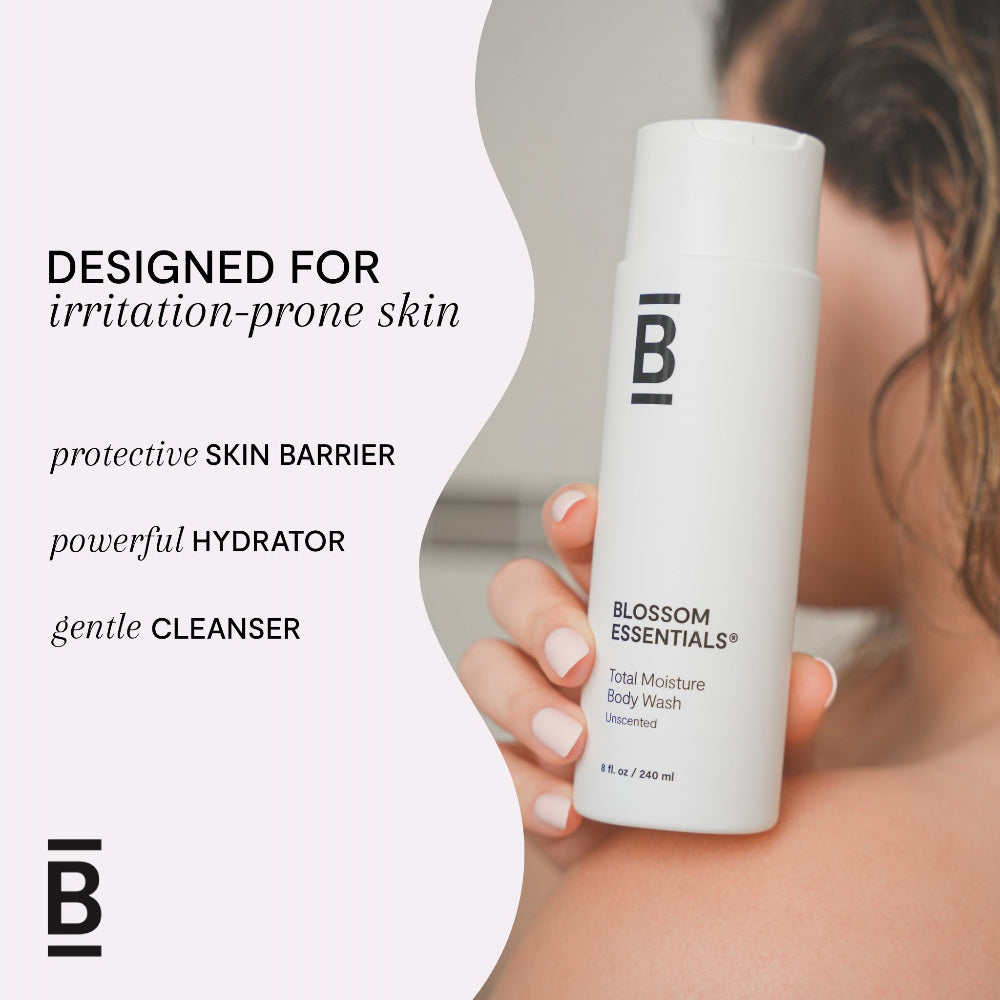 Blossom Essentials body wash bottle held by a person with product features listed.