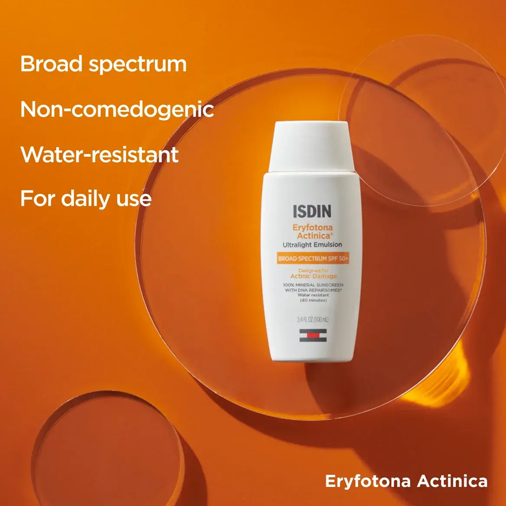 ISDIN Eryfotona Actinica SPF 50+ bottle centered on an orange graphic background with text highlighting key product benefits.