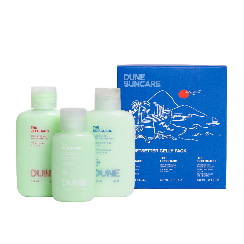 Three bottles of Dune Suncare products with a blue packaging box on a white background