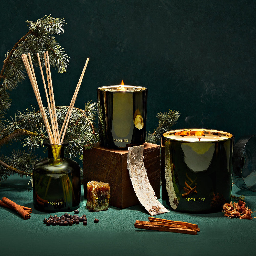 Apotheke candles with decorative elements on a dark background