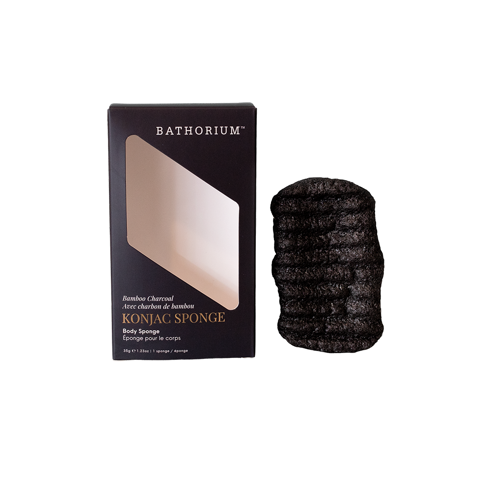 Bathorium Konjac Sponge body sponge shown next to its black retail box on a plain white background.