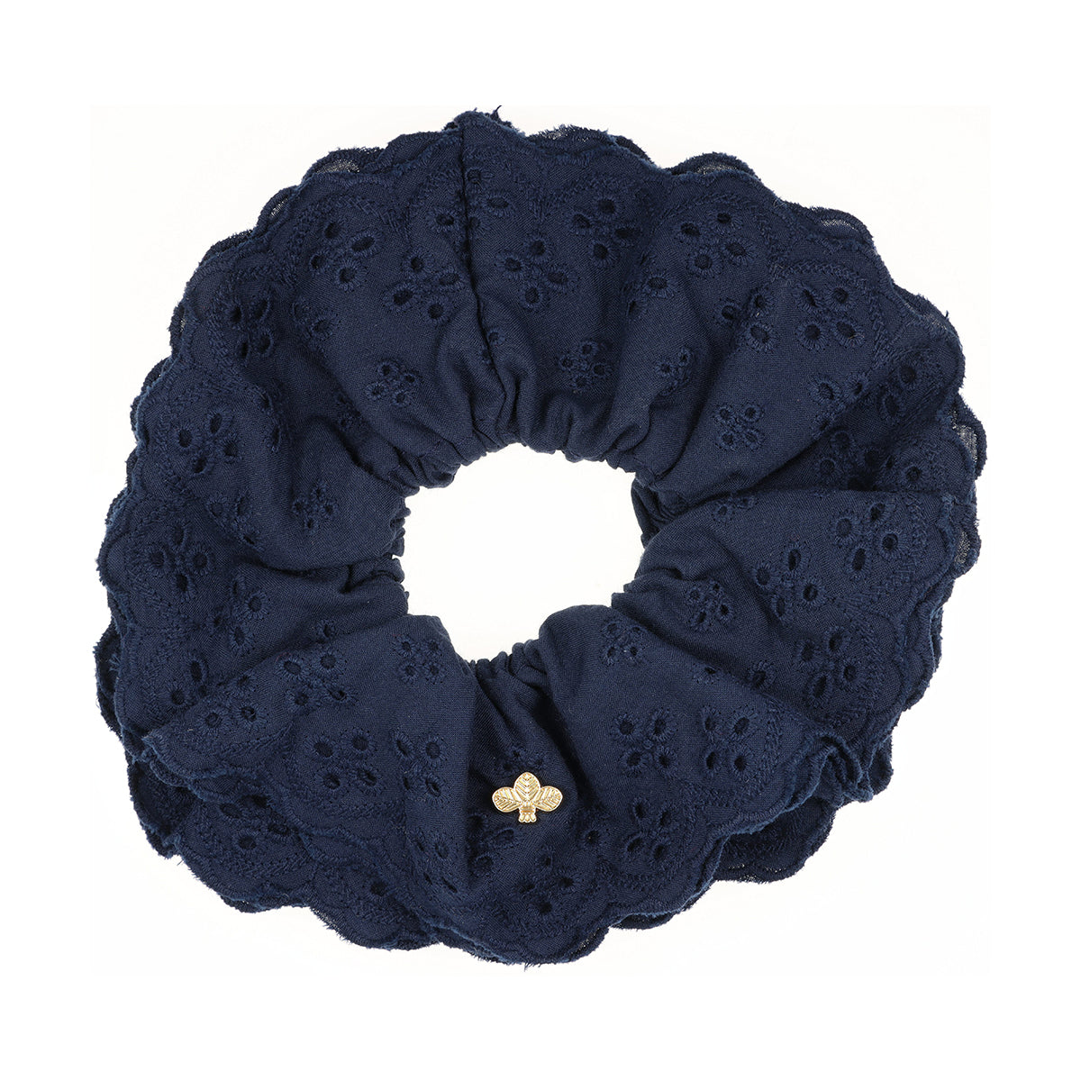 Navy L. Erickson Scrunchie on a white background.