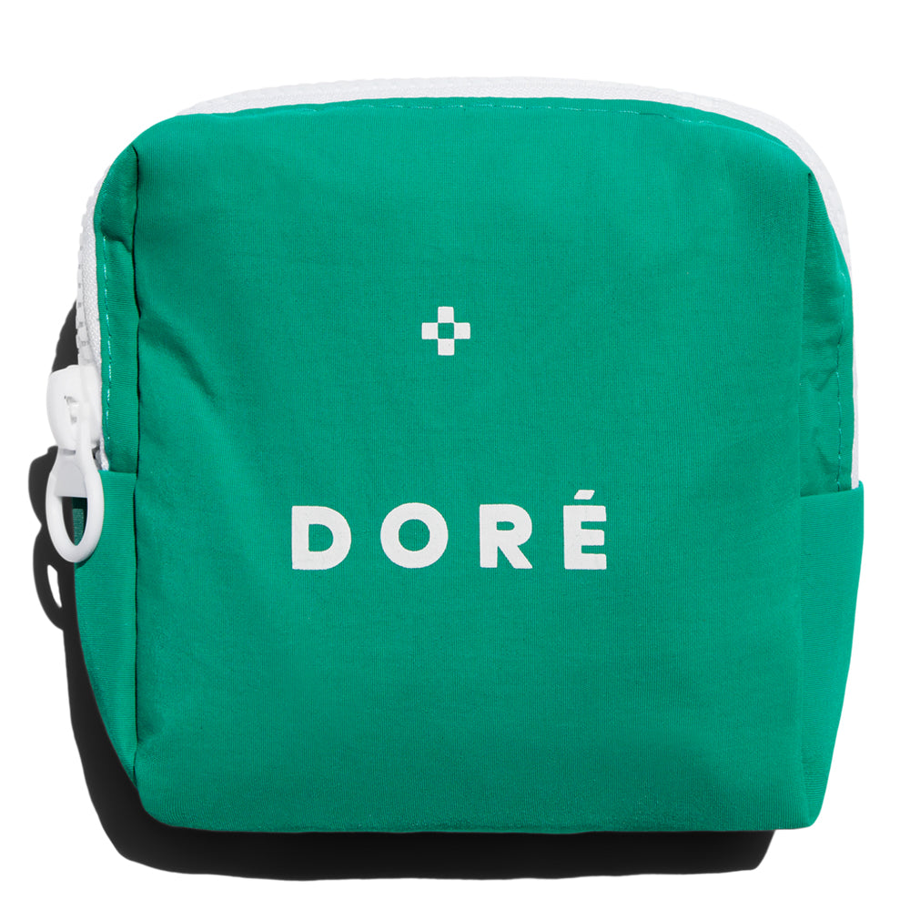 Green bag with 'Dore' branding on a white background