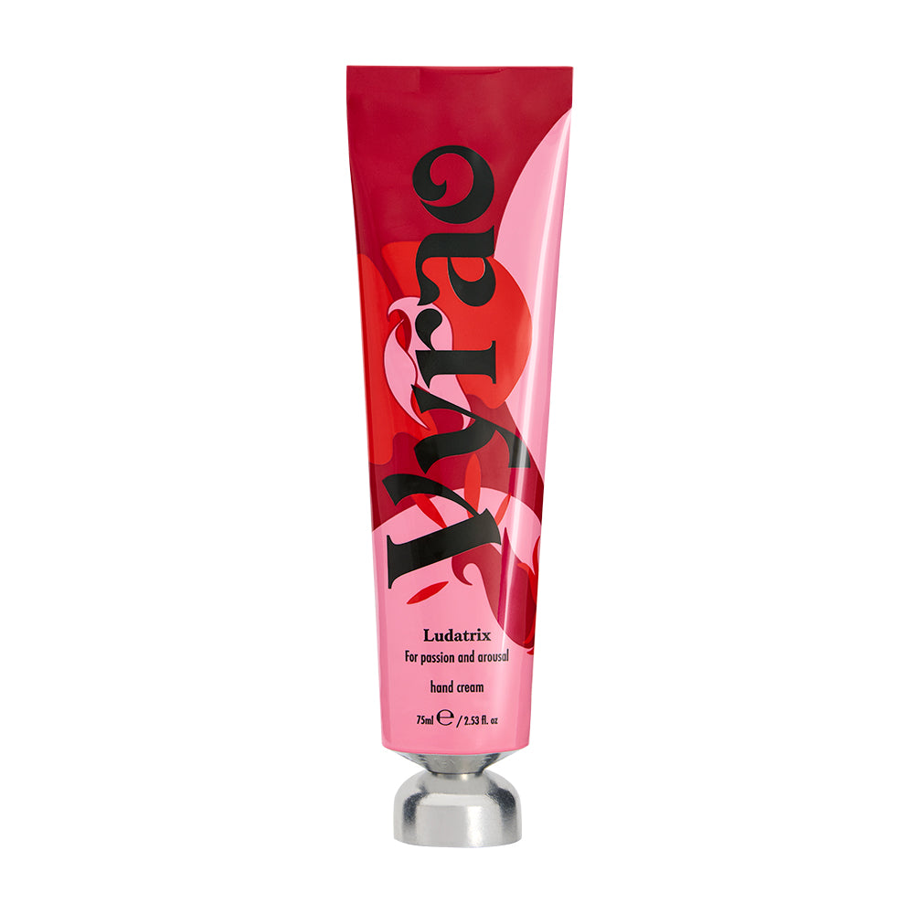 Red and pink tube of hand cream labeled 'Ludatrix' on a white background