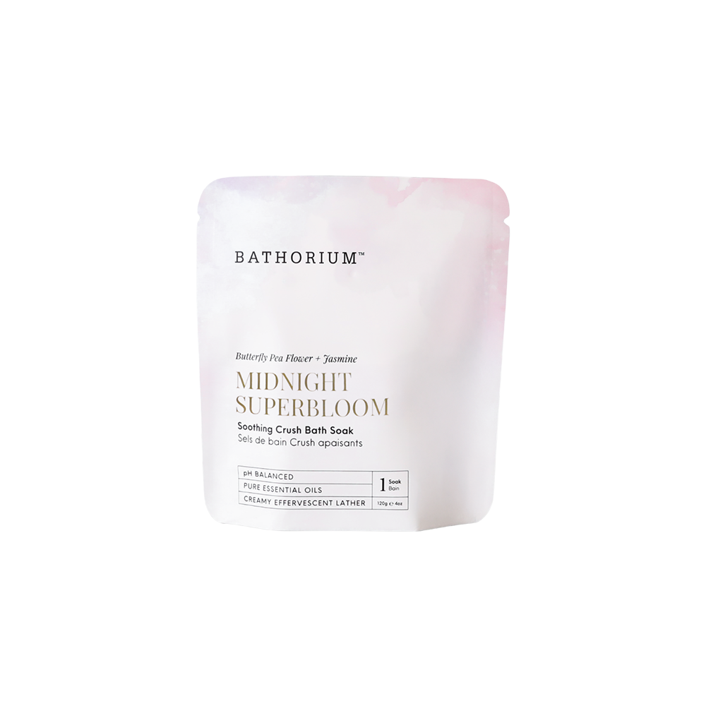 A stand-up pouch of 120g Bathorium Midnight Superbloom Soothing Crush Bath Soak on a clean white background.