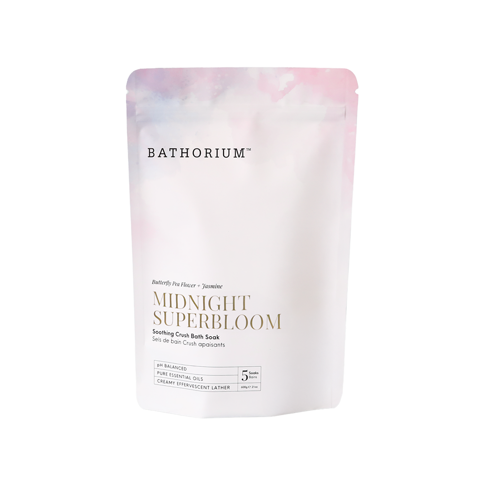A stand-up pouch of 600g Bathorium Midnight Superbloom Soothing Crush Bath Soak