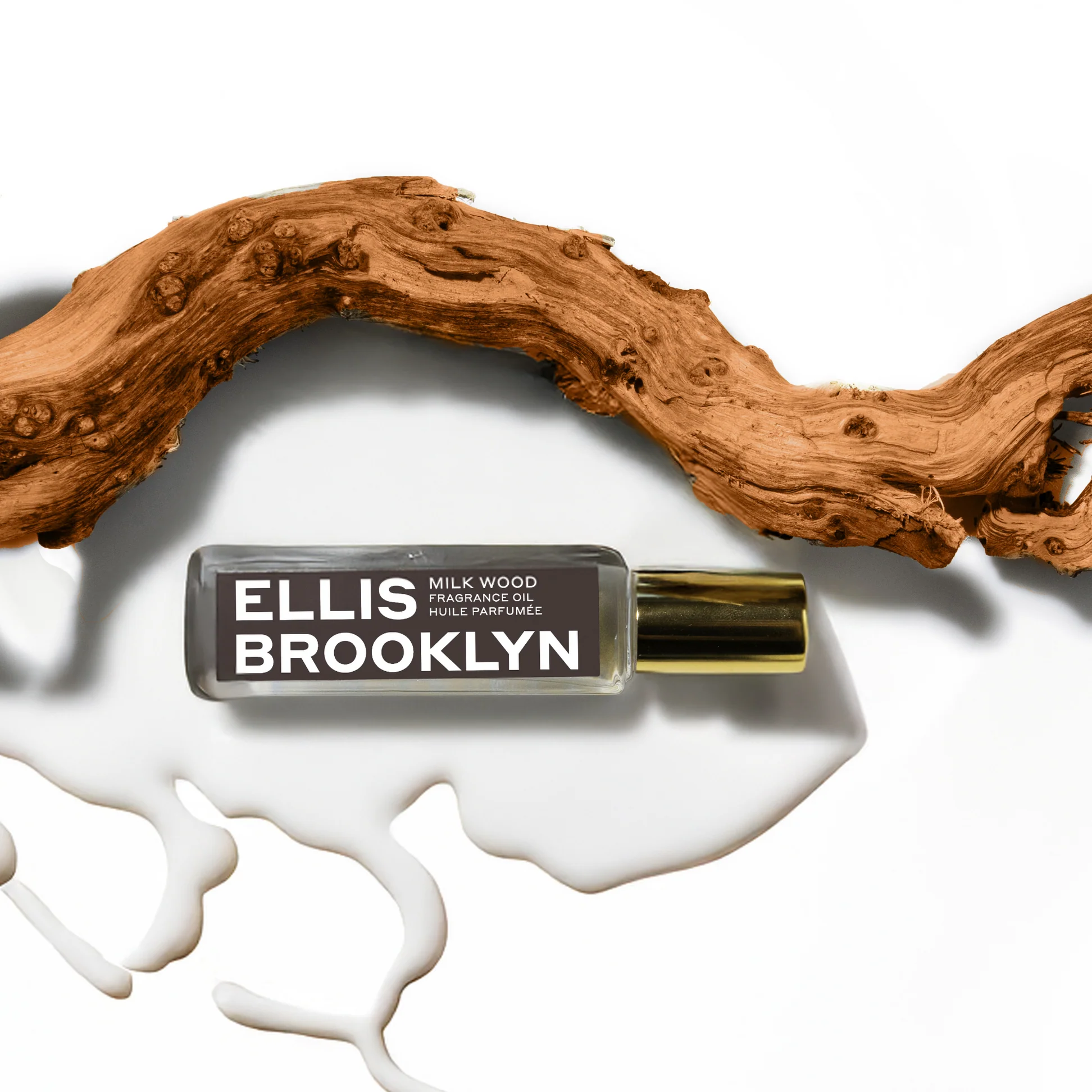 Ellis Brooklyn Milk Wood bottle with. milk and wood on a white background