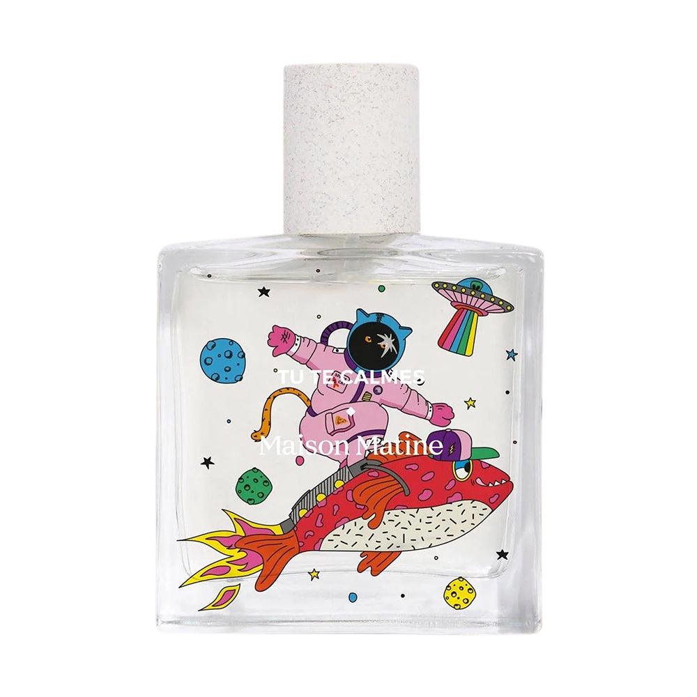 Perfume bottle with colorful space-themed design and 'Maison Matine' branding on a white background