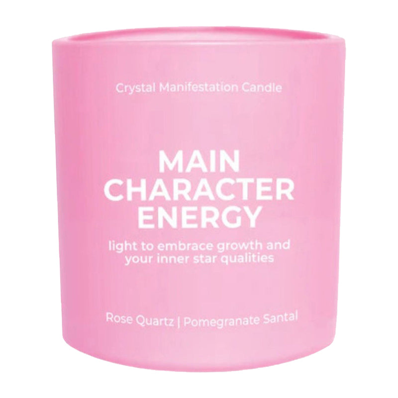 Pink candle labeled 'Main Character Energy' with text on a white background