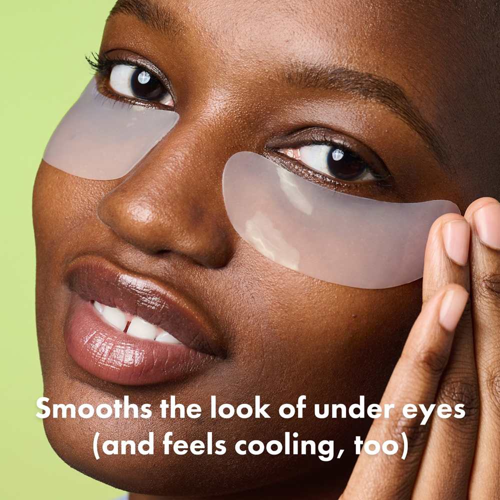 Woman wearing eye patches with text on a green background