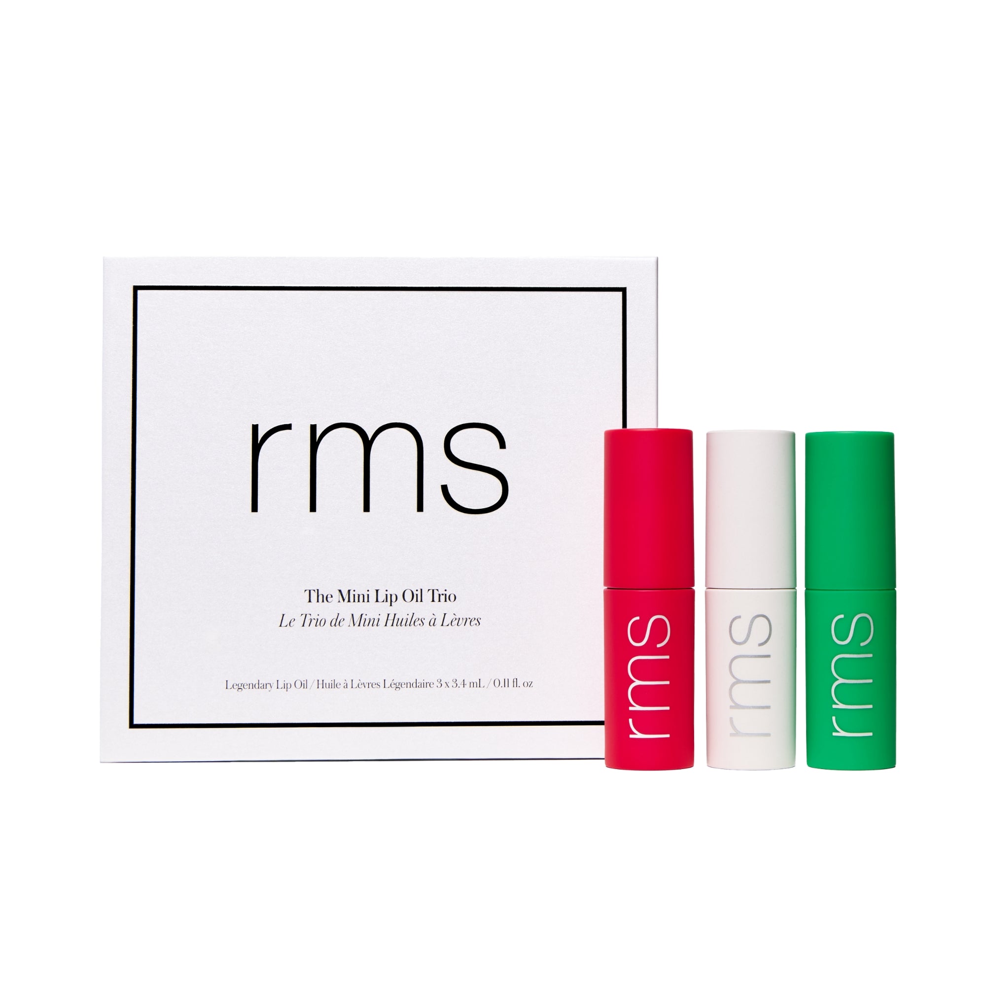 RMS lip oil trio with packaging on a white background