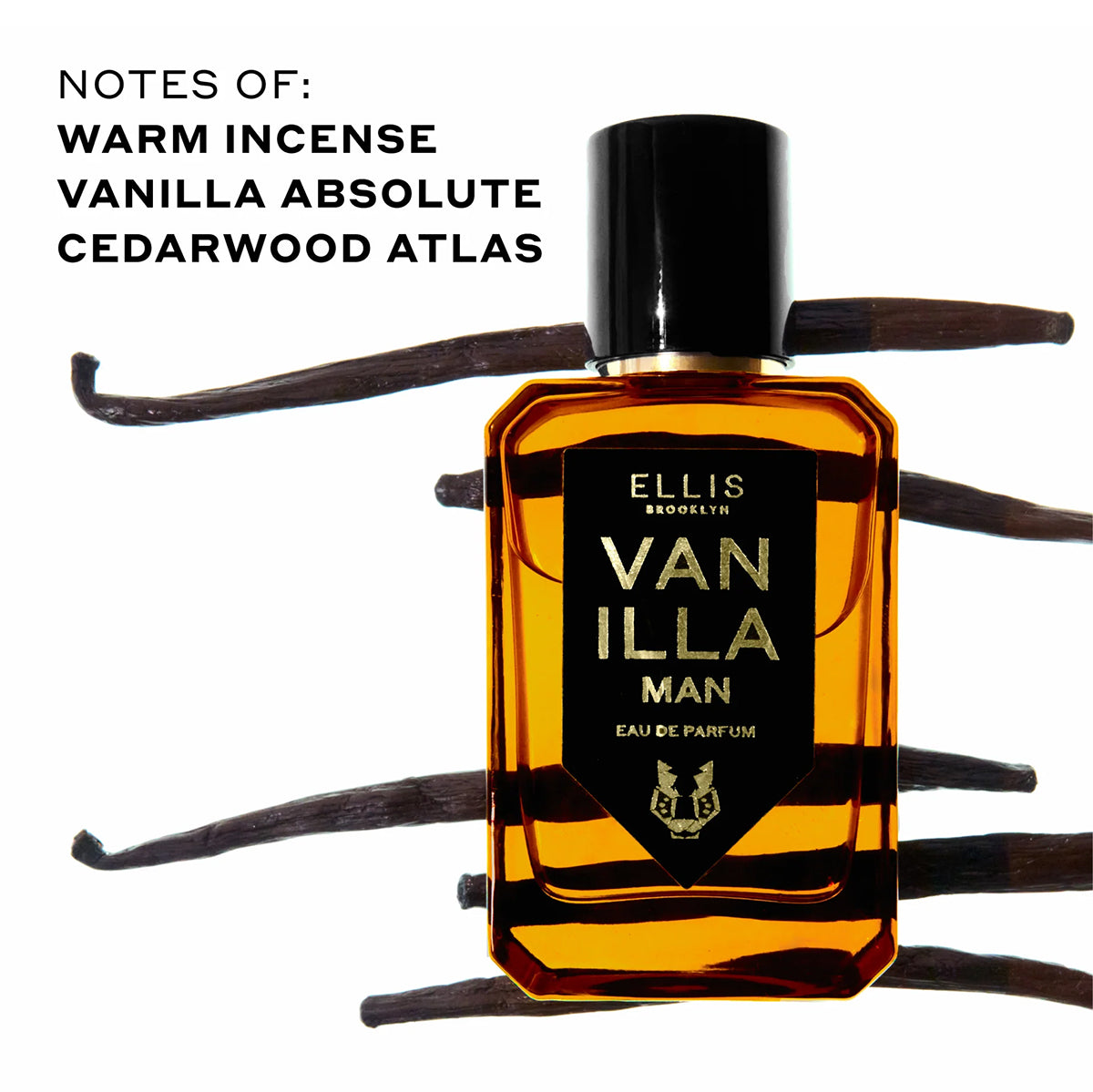 Perfume bottle labeled 'Vanilla Man' by Ellis Brooklyn with vanilla beans around it on a white background.