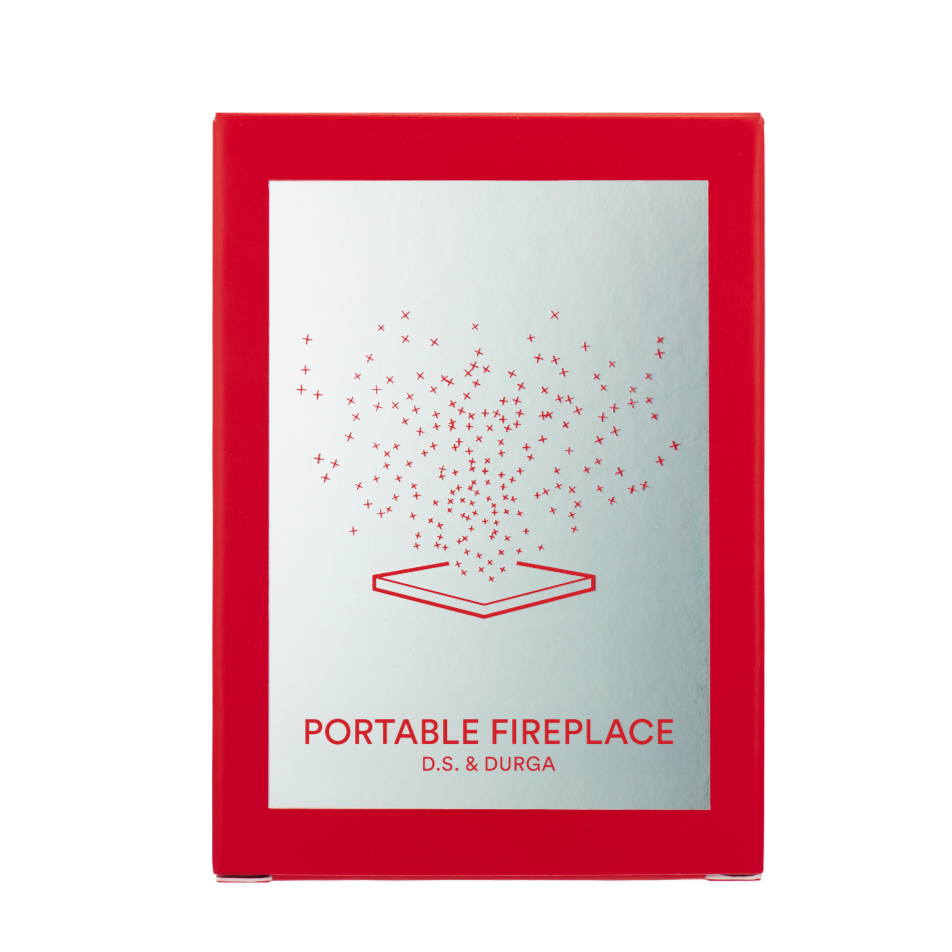 Red portable fireplace with minimalist design on a white background