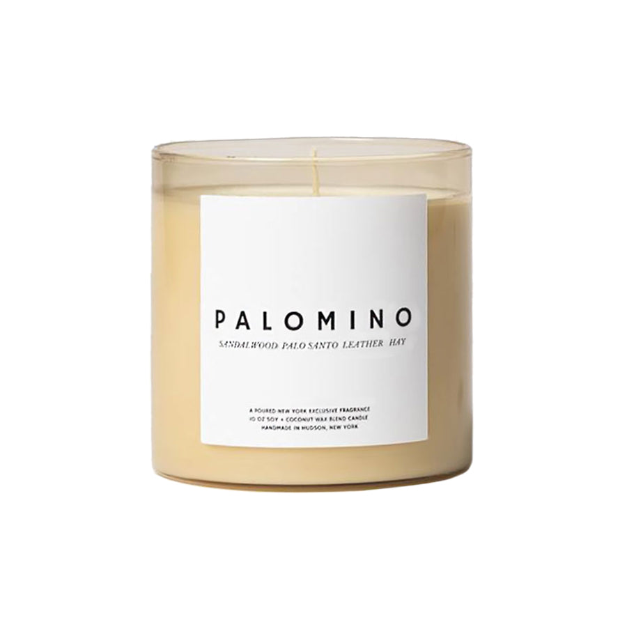 Candle with 'Palomino' label on a white background