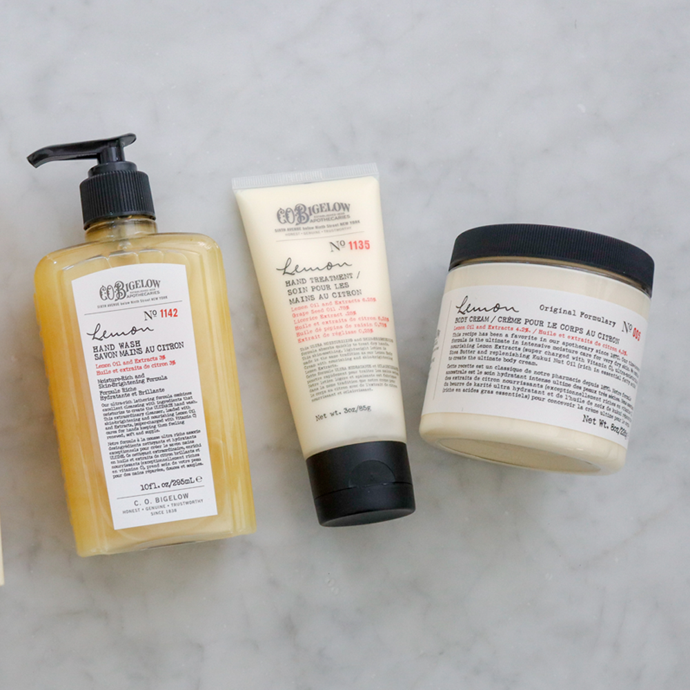 Body Cream, Hand Wash & Hand Treatment on a marble surface