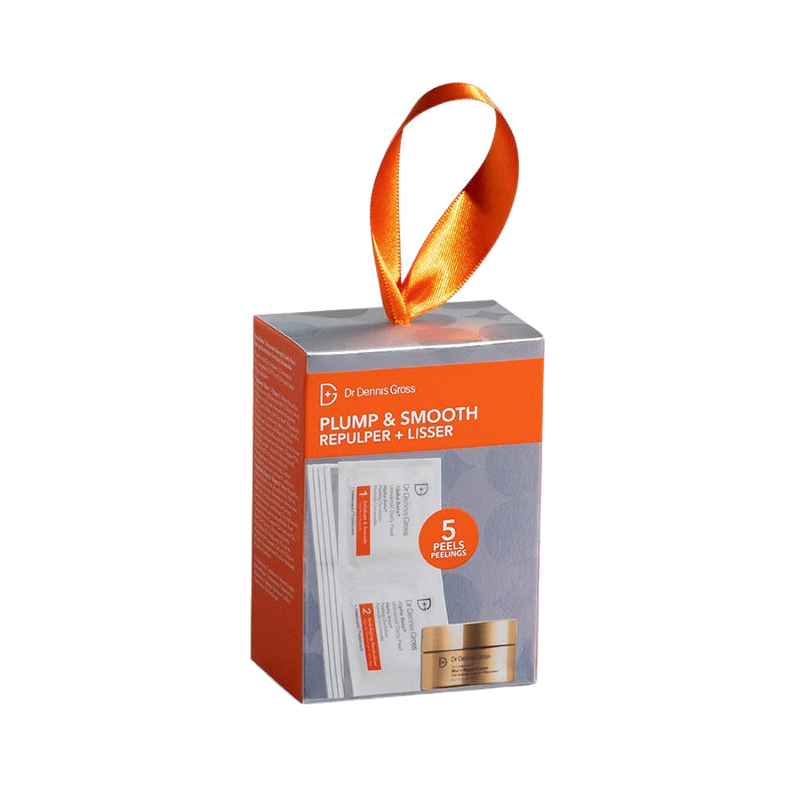 Cosmetic packaging with an orange ribbon on a white background