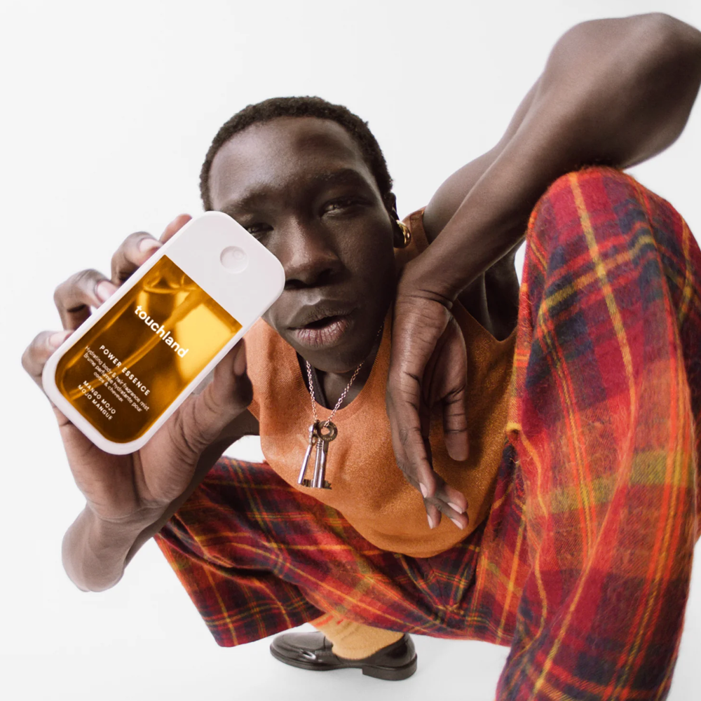 Person holding a product with a white background