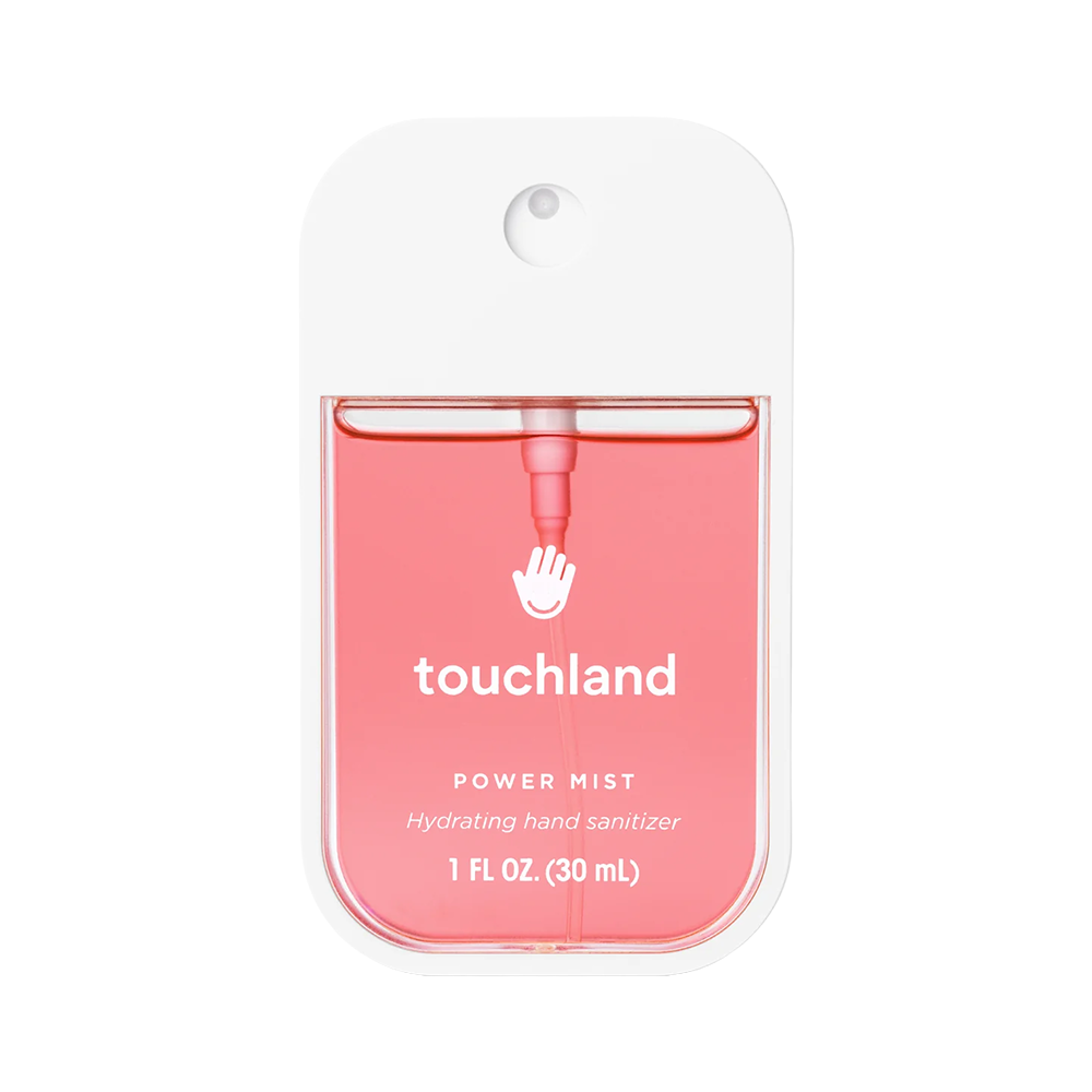 Pink hand sanitizer with 'touchland' branding on a white background
