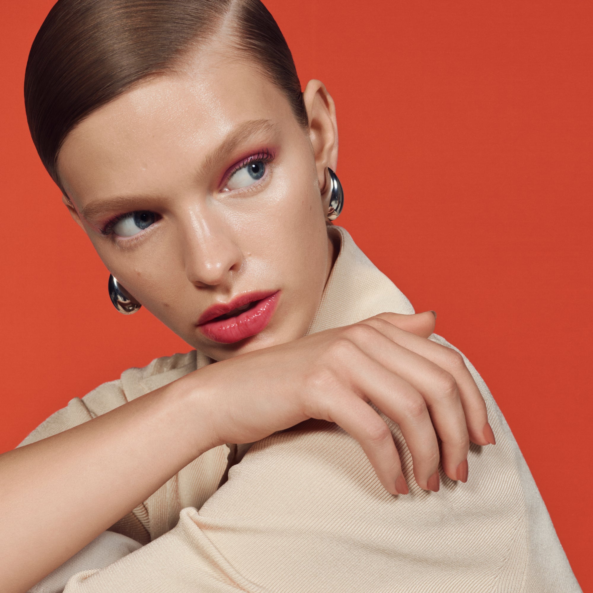 Model wearing U Beauty Resurfacing Compound